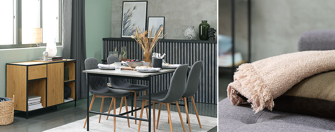  Vardagsrum med matbord med betong-look, grå matstolar och en ek-skänk