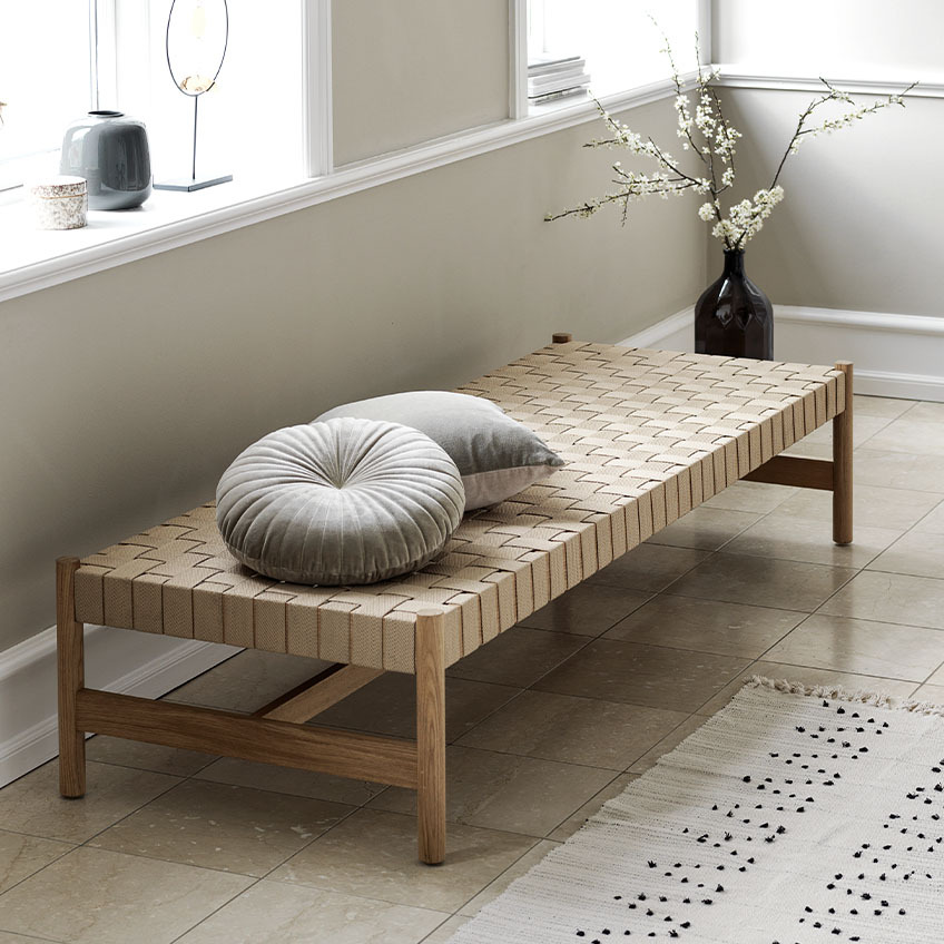 Daybed made from solid oak and oak veneer with woven surface
