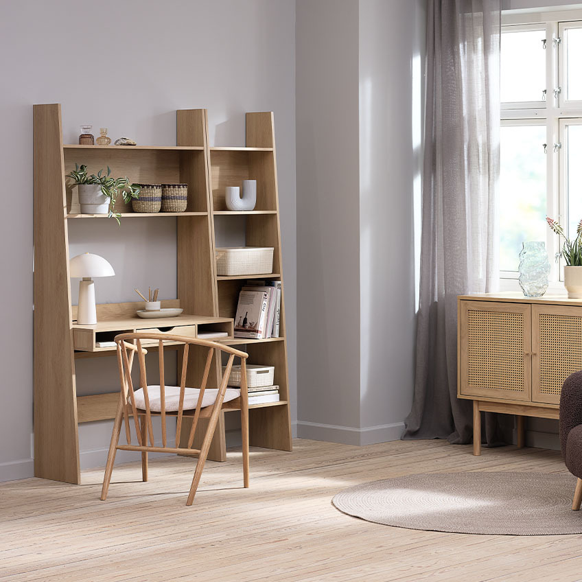 Solid oak chair by bookcase and desk 