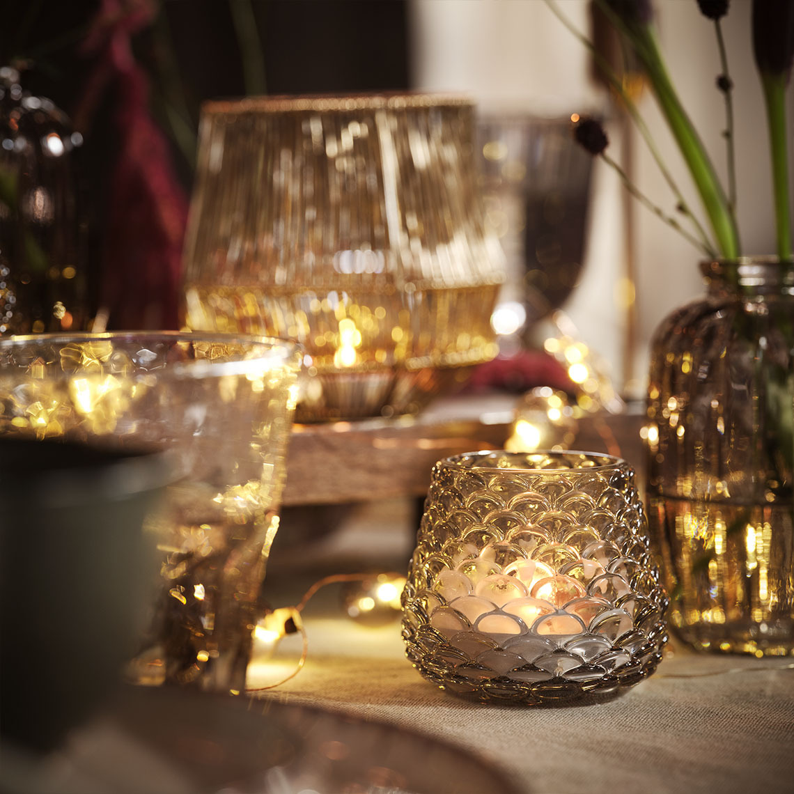 värmeljus i värmeljushållare och ljusslingor 