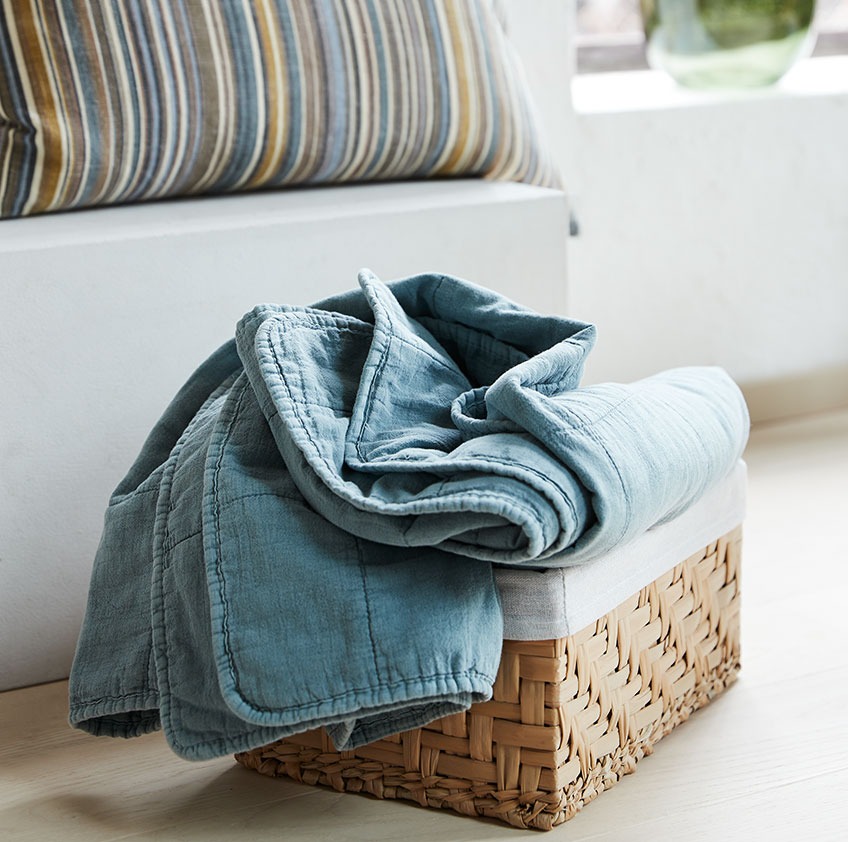 EJNO basket and VALMUE throw Wicker basket with blue throw